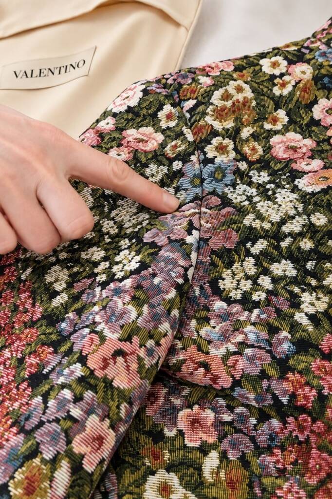 Inside a Valentino jacquard jacket during alteration