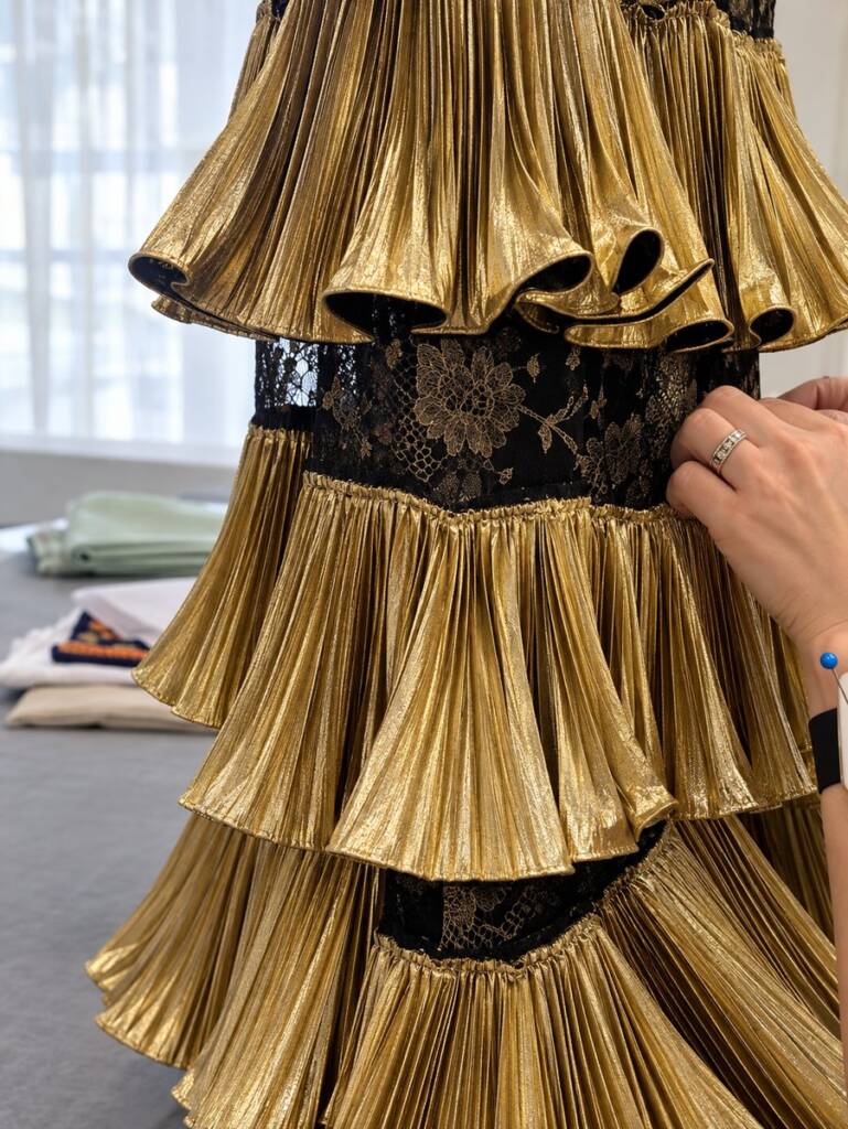 Pleats and lace kept intact